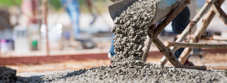 Concrete pouring during commercial concreting floors of building